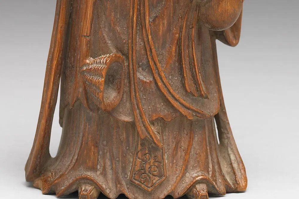 清代竹雕八仙(何仙姑)局部 (1)